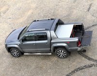 VW Amarok Aventura Double Cab from 2010  Roll-on in black aluminum retractable tonneau cover